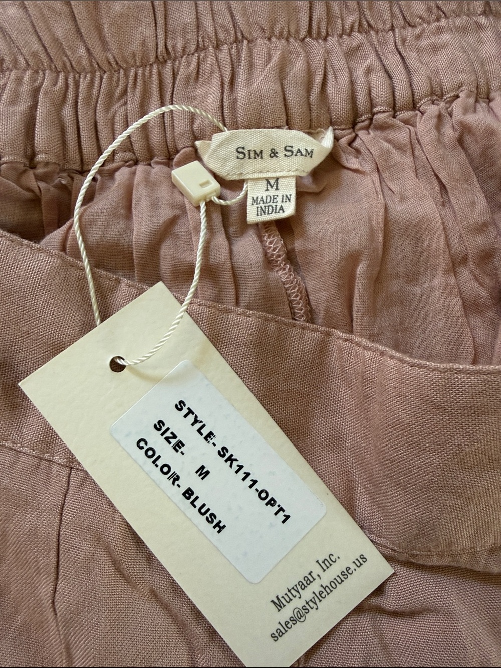 Women's Pleated Mini Skirt in Dusty Rose - Picture 2 of 5